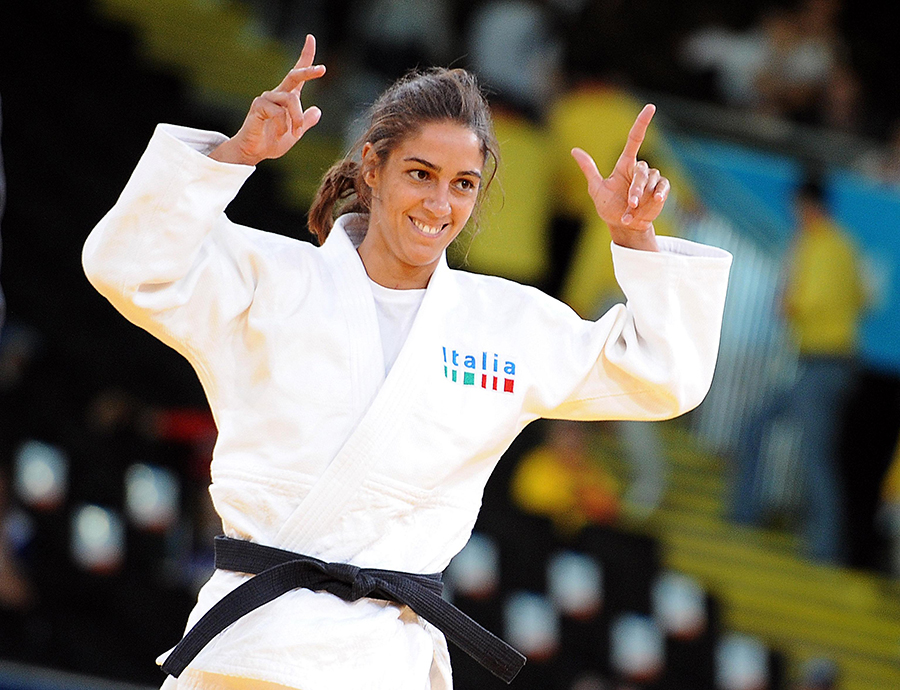 Giulia Quintavalle of Italy (white) celebrates her victory aganist Sabrina Filzmoser of Austria in the Women -57 kg semi-final at the London 2012 Olympic Games Judo competition repechage , London, Britain, 30 July 2012. ANSA/CLAUDIO ONORATI